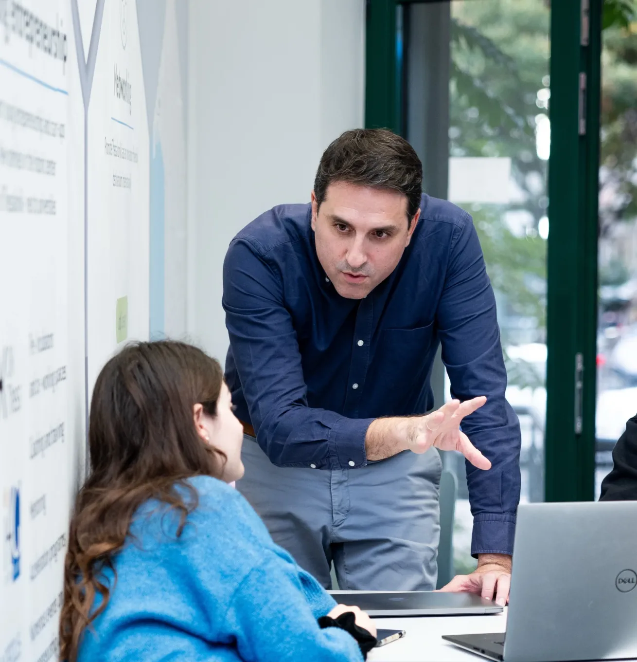 Dimitrios Kourtesis coaching a young entrepreneur.